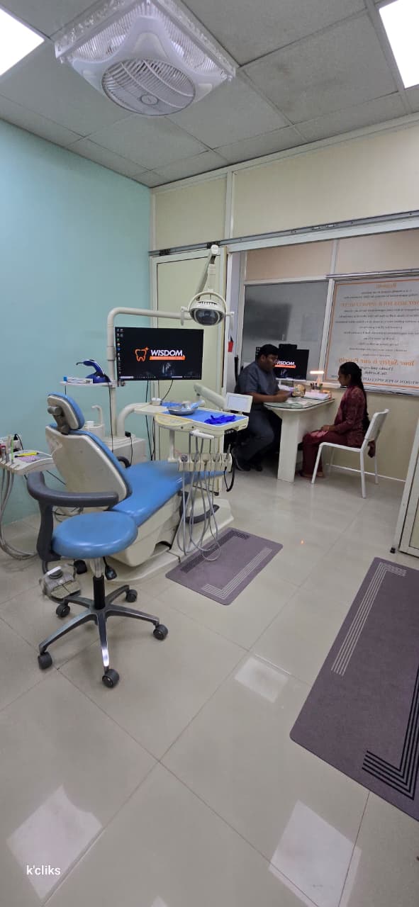 Treatment room and consultation area at Wisdom Superspeciality Dental Clinic in Hyderabad